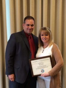 East Bridgewater Detective Sgt. Scott Allen and EB Hope Director Susan Silva both received the 2016 Excellence in Volunteer Services Award from the Community Services of Greater Brockton (Courtesy Photo).