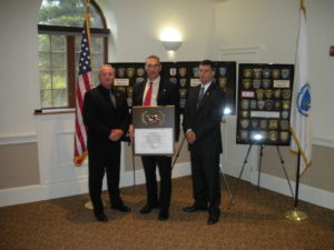 Arlington Police Captain Richard Flynn, Chief Frederick Ryan, and Officer Vitaly Volkov. (Courtesy of Arlington Police Department)