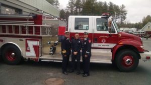 Left-to-right: Maynard Fire Chief Anthony Stowers, Firefighter Michael Cisek and Captain Sean Kiley at Cisek's graduation at the Massachusetts Firefighting Academy. (Courtesy Photo)