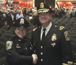 Officer Joanne Ballard and Chief Donald Cudmore of the Georgetown Police Department at the 3rd ROC Academy Class in Plymouth graduation at Brockton High School.