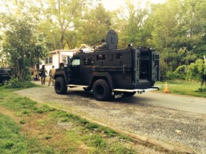 The CEMLEC Swat Team at the suspect's home (Photo courtesy of the Boxborough Police Department)