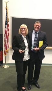 Dr. Sarah Abbott and Chief Craig Davis with their awards from the Department of Mental Health.