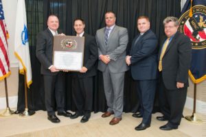 Left to right: Reading Police Chief Mark D. Segalla, Lt. Detective Richard P. Abate, Sgt. Kevin Brown, Deputy Chief David J. Clark and Town Manager Robert LeLacheur. (Courtesy Photo)