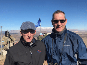 Chief Frederick Ryan, right, stands with Boston Police Commissioner William Evans, left, who also attended the trip to Israel, at the border of Israel and Syria while taking part in a training mission in Israel. (Courtesy Photo)