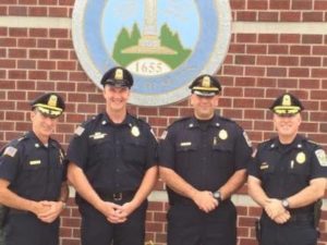Two sergeants at the Chelmsford Police Department were promoted to lieutenant on Oct. 5. Left to right: Deputy Chief Dan Ahern, Lt. Todd Ahern, Lt. Gary Hannagan and Chief James Spinney. (Courtesy Photo)