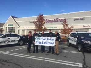 Merrimac and West Newbury Police in front of the Stop & Shop on Macy Street in Merrimac -- the location where residents can drop off donations for the regional food drive. (Courtesy Photo)