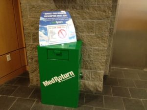 Citizens may place any unused, unneeded, expired, and/or unwanted prescriptions or over-the-counter medications into the disposal unit, no questions asked. Simply open the mailbox-style. (Courtesy of the Andover Police Department)