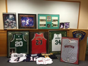 Saugus Police recovered $5,500 worth of Boston memorabilia that was stolen from Barber Masters in October. (Courtesy Photo)